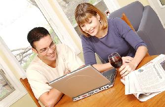 Couple reading news on Internet